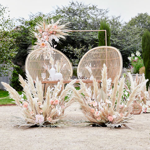 Pampas wedding supplies arranged in a styled party setting.