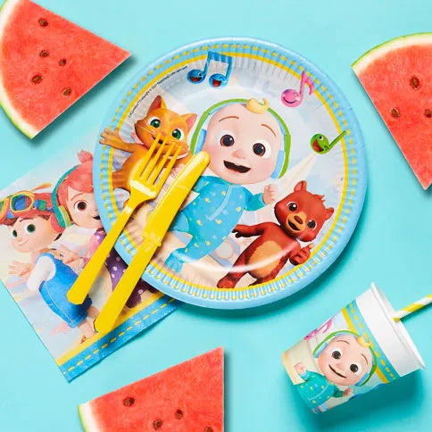 Cocomelon party supplies arranged in a styled party setting.