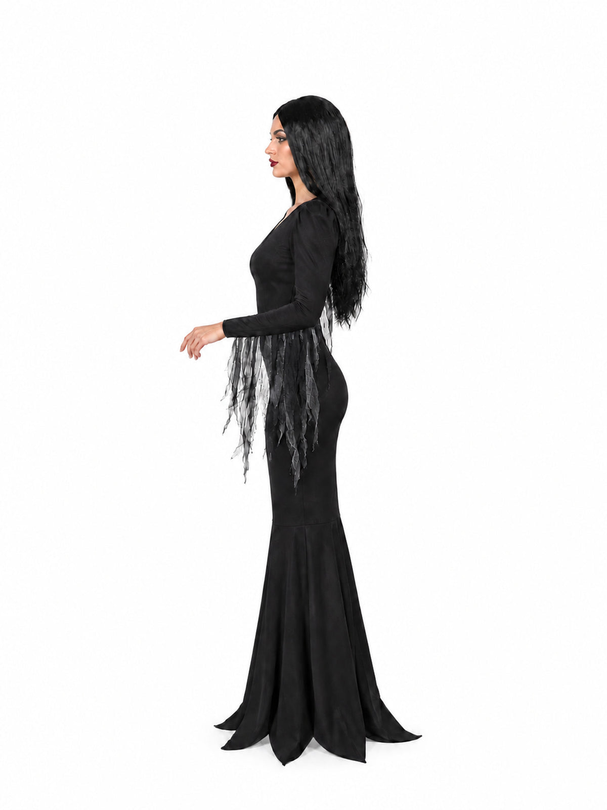 Side view of Morticia Addams adult costume showing the fitted black dress, sheer sleeve drapes and long black wig.