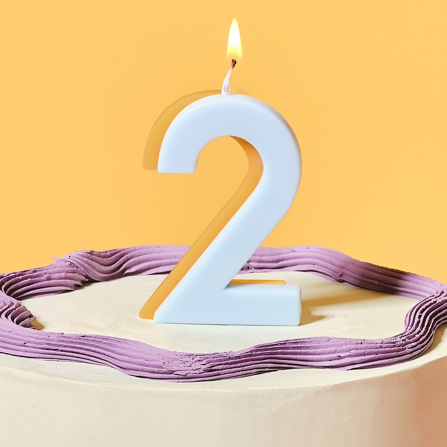 Blue and Yellow Number 2 Candle