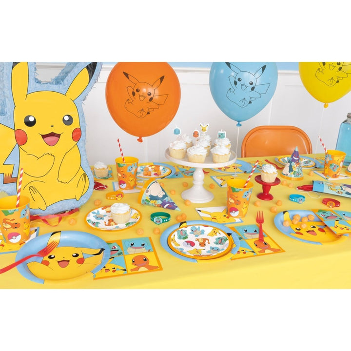 A colourful birthday party styled with Pokémon tableware and decorations.