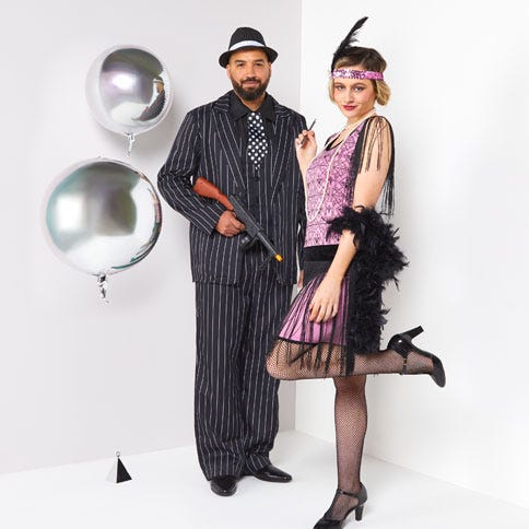 Couple in 1920s costumes